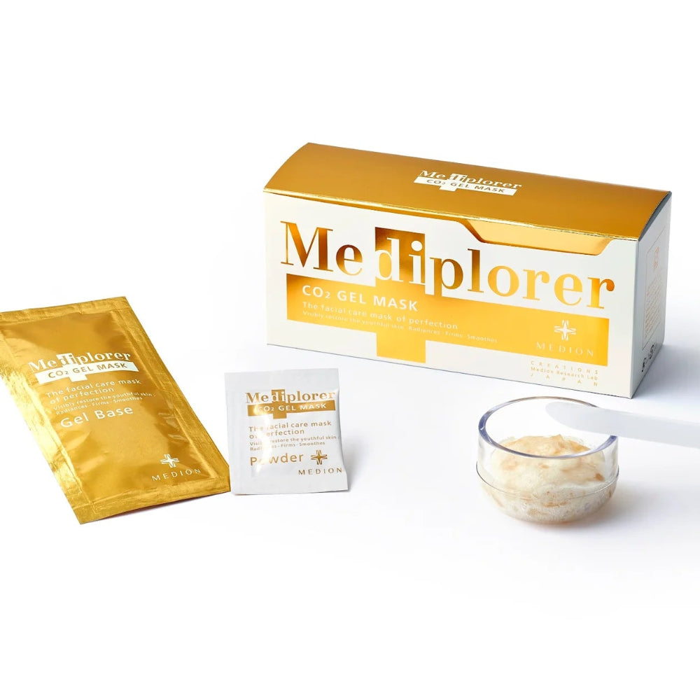 Me Tiplorer product set including boxes, packets, and a glass with powder on a white background