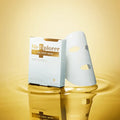 MeTiplorer CO2 sheet mask packaging on a reflective gold surface