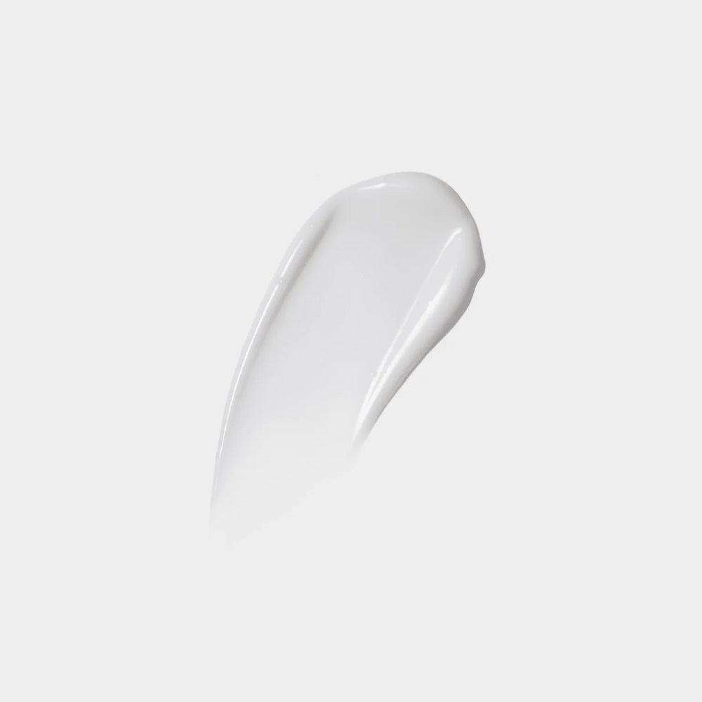 White cream swatch on a light gray background