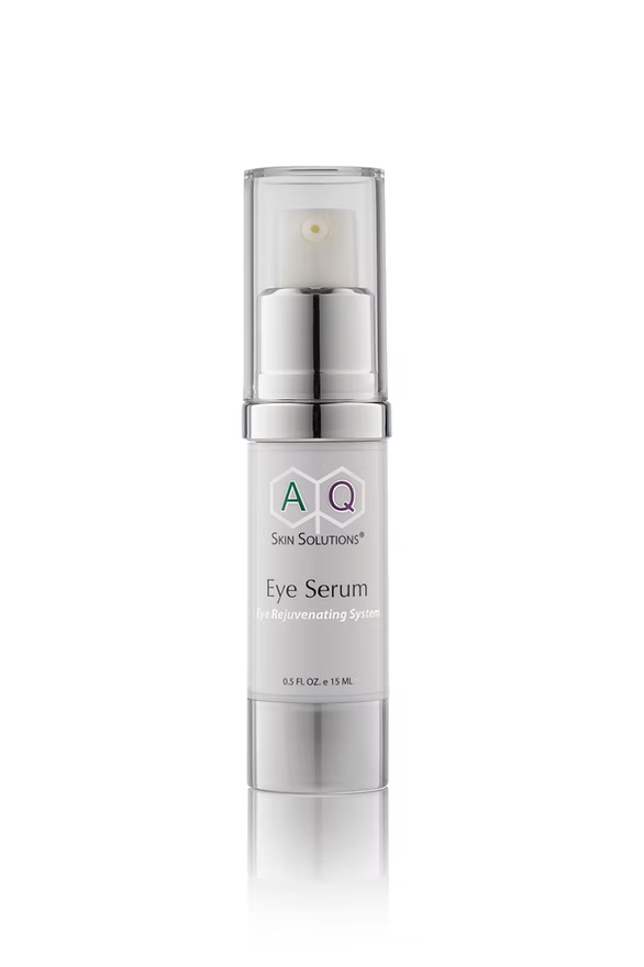 Eye serum bottle with silver cap and white label on a white background