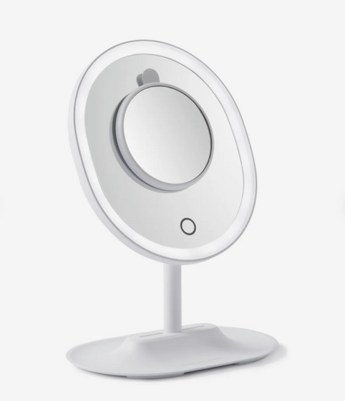 White vanity mirror with LED lights on a white background