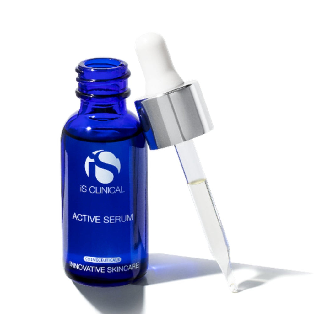 Blue serum bottle with dropper on a white background