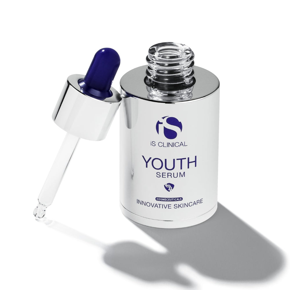 IS Clinical Youth Serum bottle with dropper on a white background